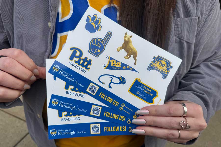 Sticker sheets being held up