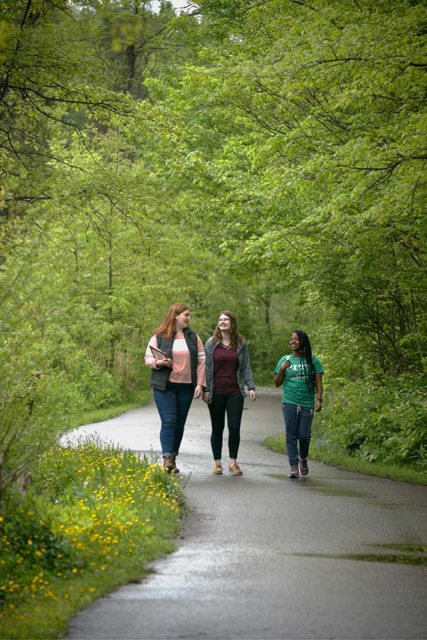 Girls walking on trail