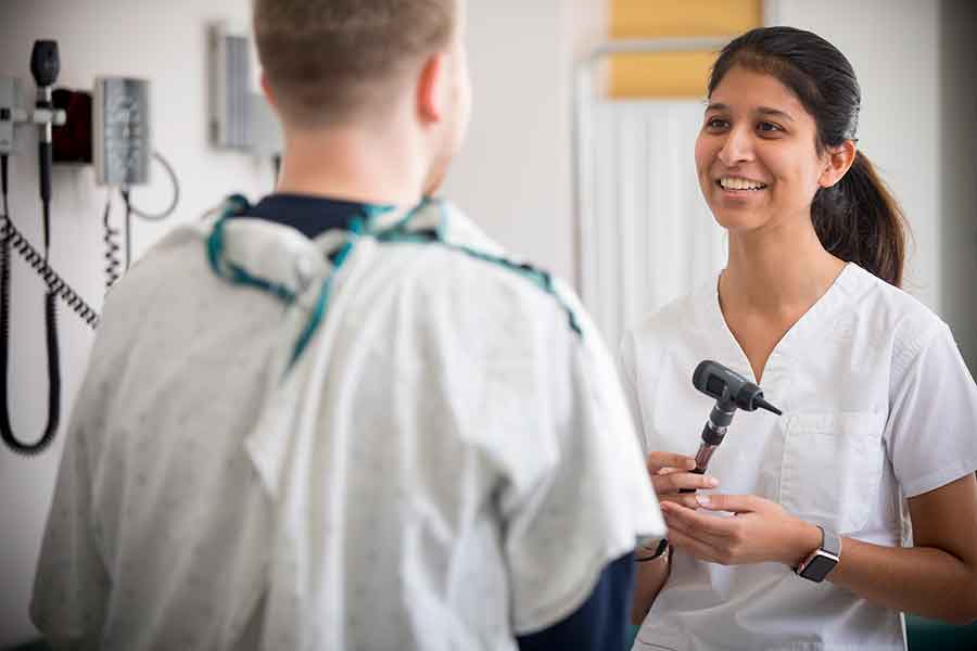 Nurse with student