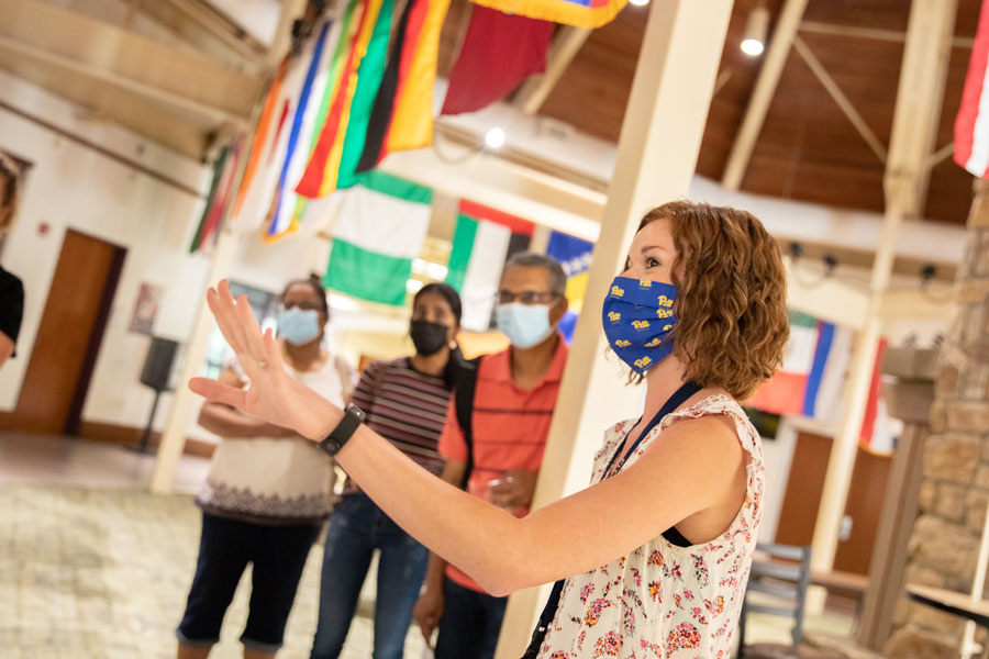 Tour group in commons with masks
