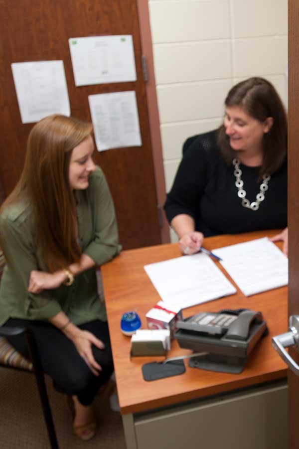 Sue Gleason and student
