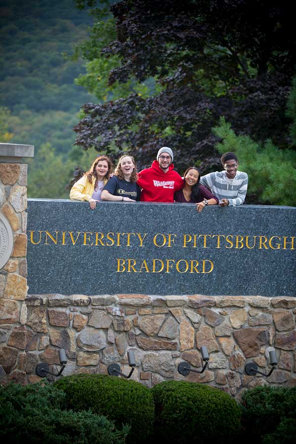 Students on campus sign
