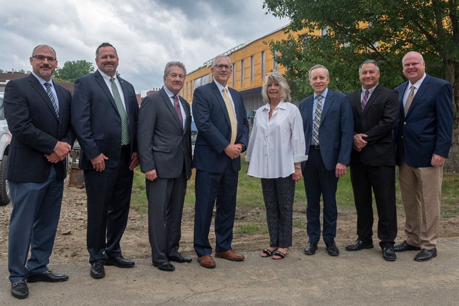 Group of people standing in front of new engineering building