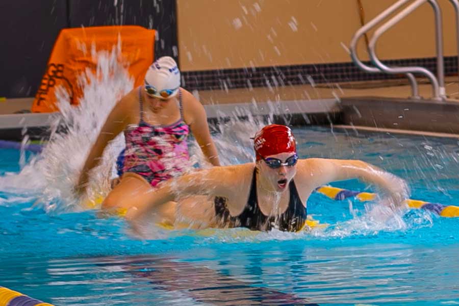 Students swimming in the pool