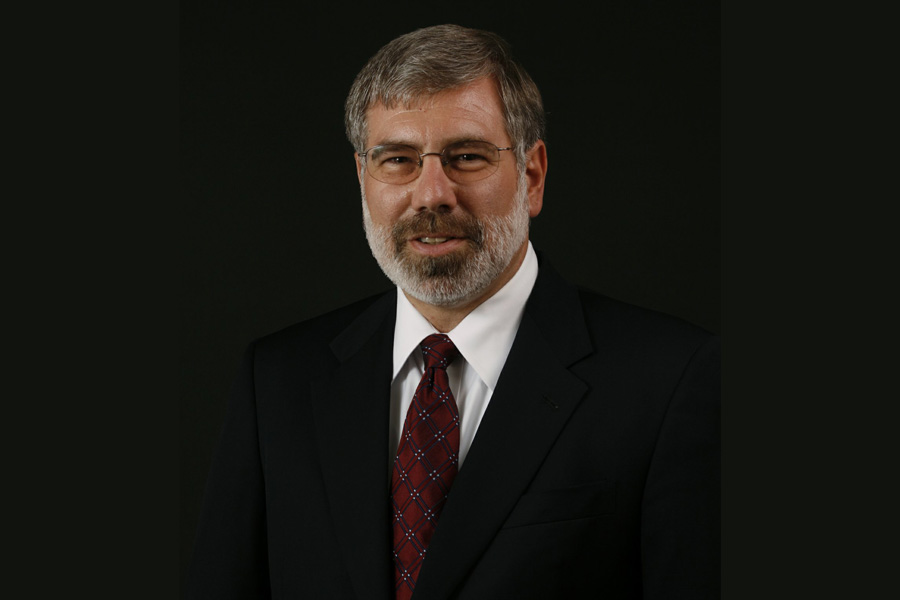 A portrait of Dr. Gilbert R. Mintz