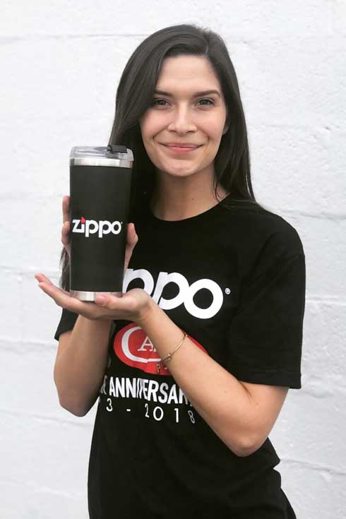 Brianna Payne holding Zippo cup