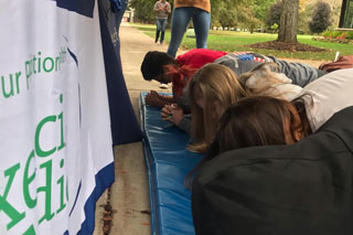 Students performing planking challenge