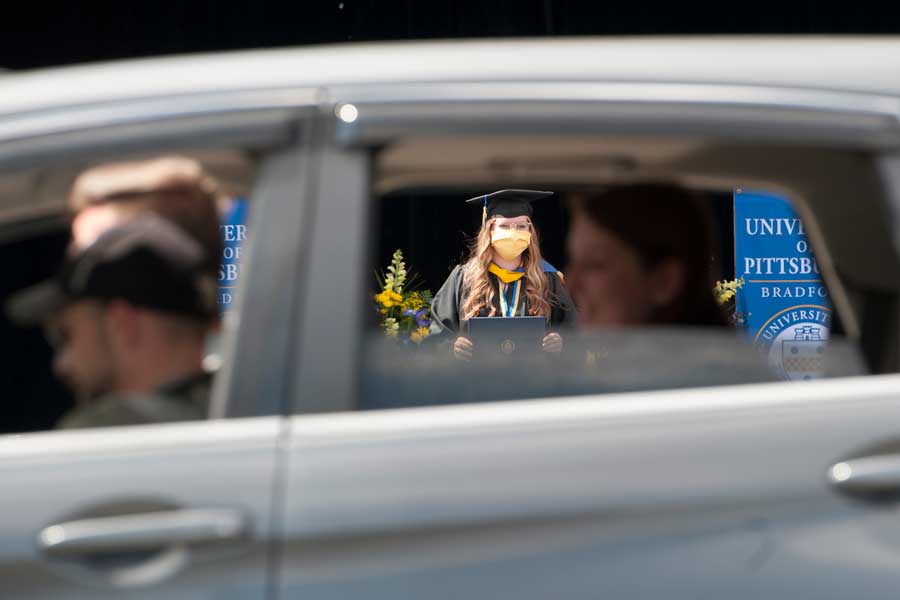 Graduate through car window