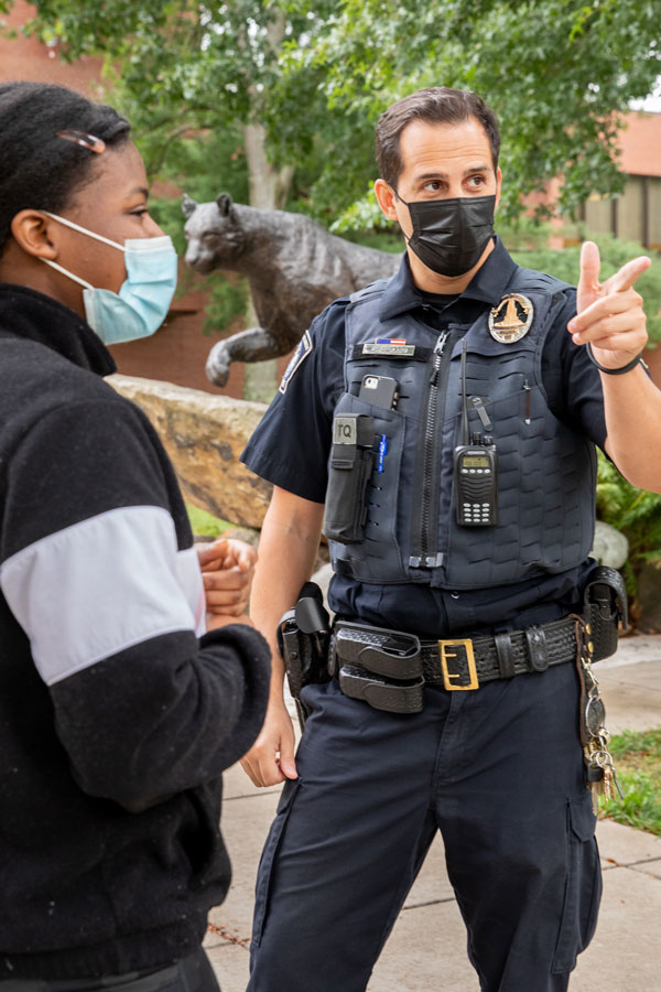 Oficer directing a student