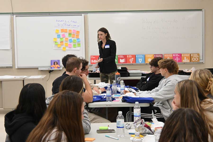 Watson facilitator speaking to highschool class