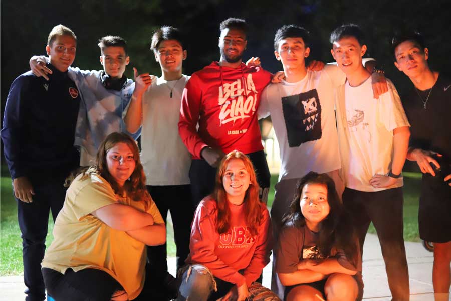 Students hanging out at a cookout