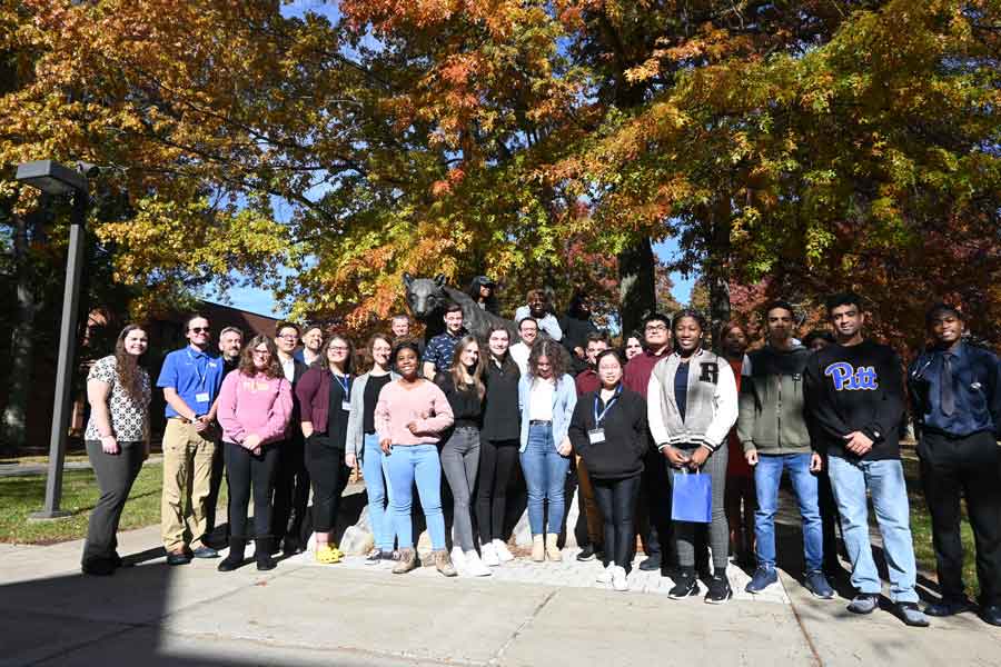 Students around the panther who participated in entrepreneurial event