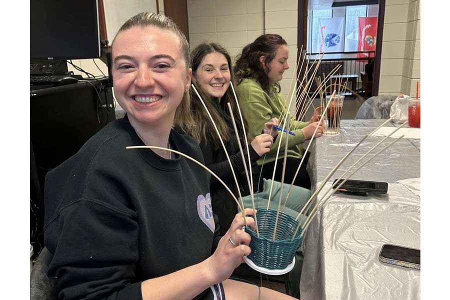 Students making baskets for the Empty Bowls and Baskets dinner