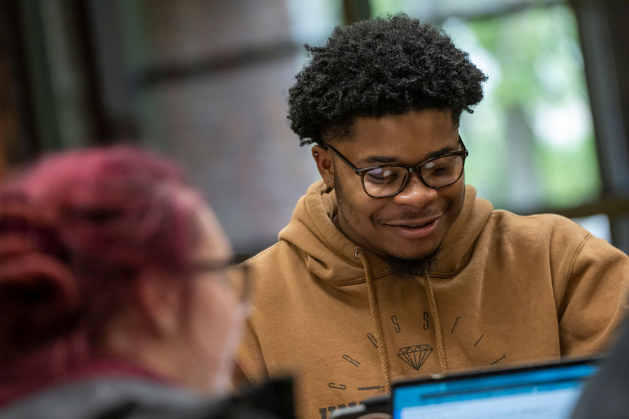 Students studying together in the library