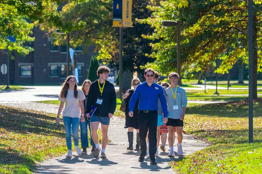 An admissions counselor giving a tour
