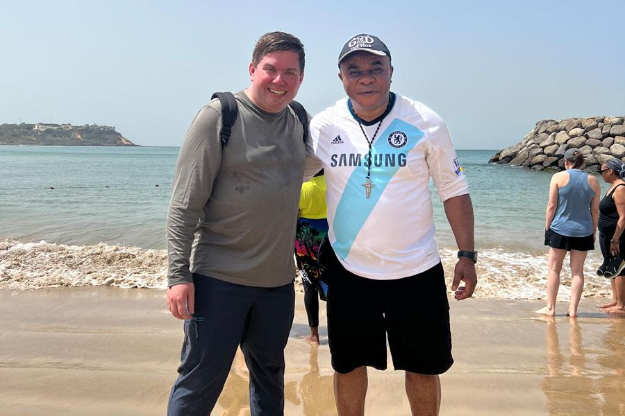 Dr. Drew Flanagan and Dr. Obinna Ezeihuoma, at the beach in Senegal
