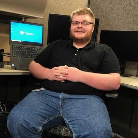Mike Skaggs sitting in office