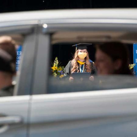 Graduate through car window