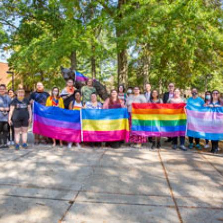 Kids with Gay Pride Flags