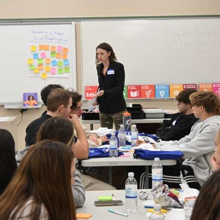 Watson facilitator speaking to highschool class