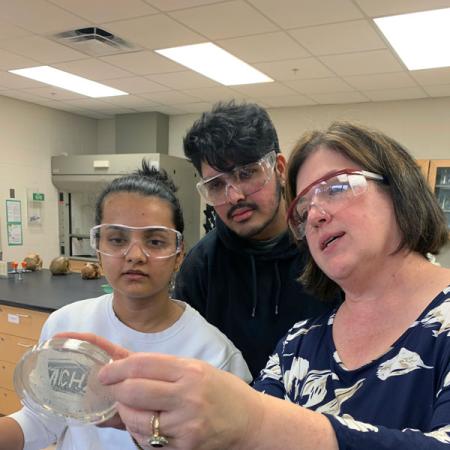 Dhimal and Khadka researching with Dr. Robin Choo