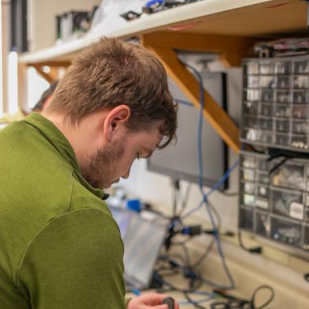 Student, Dylan Lydic, working at ARG