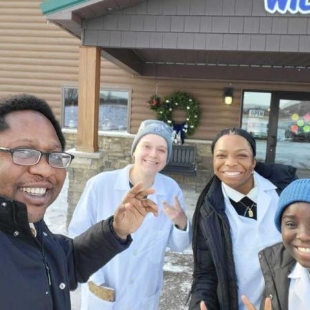 Dr. Lanre with students