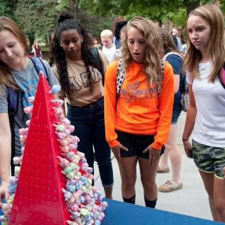 Students pick lollipops for a chance to win a prize