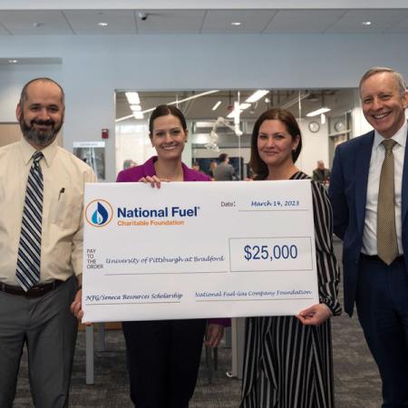 Dr. Ovidiu Frantescu and President Rick Esch with National Fuel group