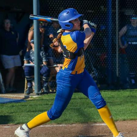 Photo of Megan Kapp playing softball