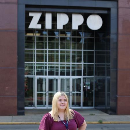 Rachel Mertz standing in front of Zippo
