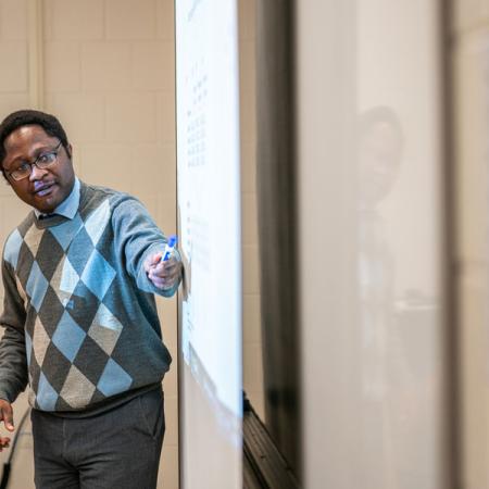 Lanre teaching a class