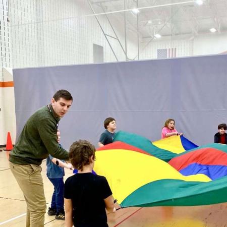 Chad Carlson working with students