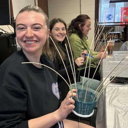 Students making baskets for the Empty Bowls and Baskets dinner