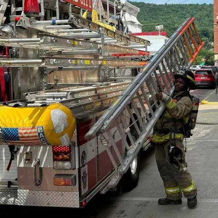 Jay Mckenzie with a firetruck